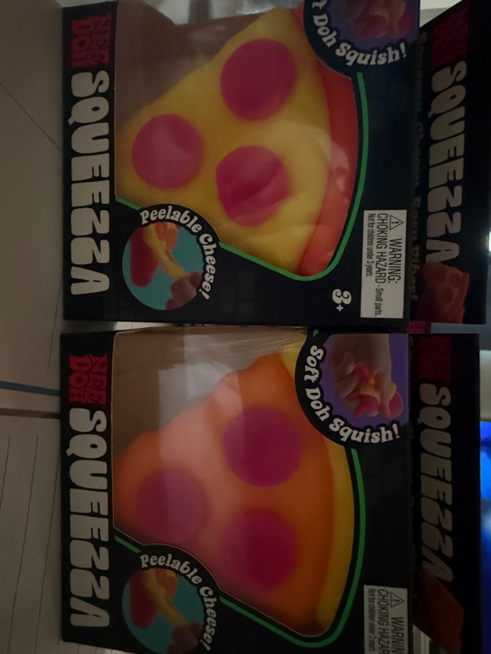 Orange NeeDoh Squeezza Pizza Squishy Toy - Picture 2 of 2
